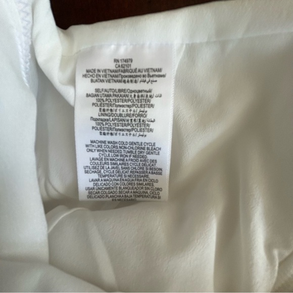 BCBGeneration | Elegant Off-Shoulder White Jumpsuit - Picture 11 of 12